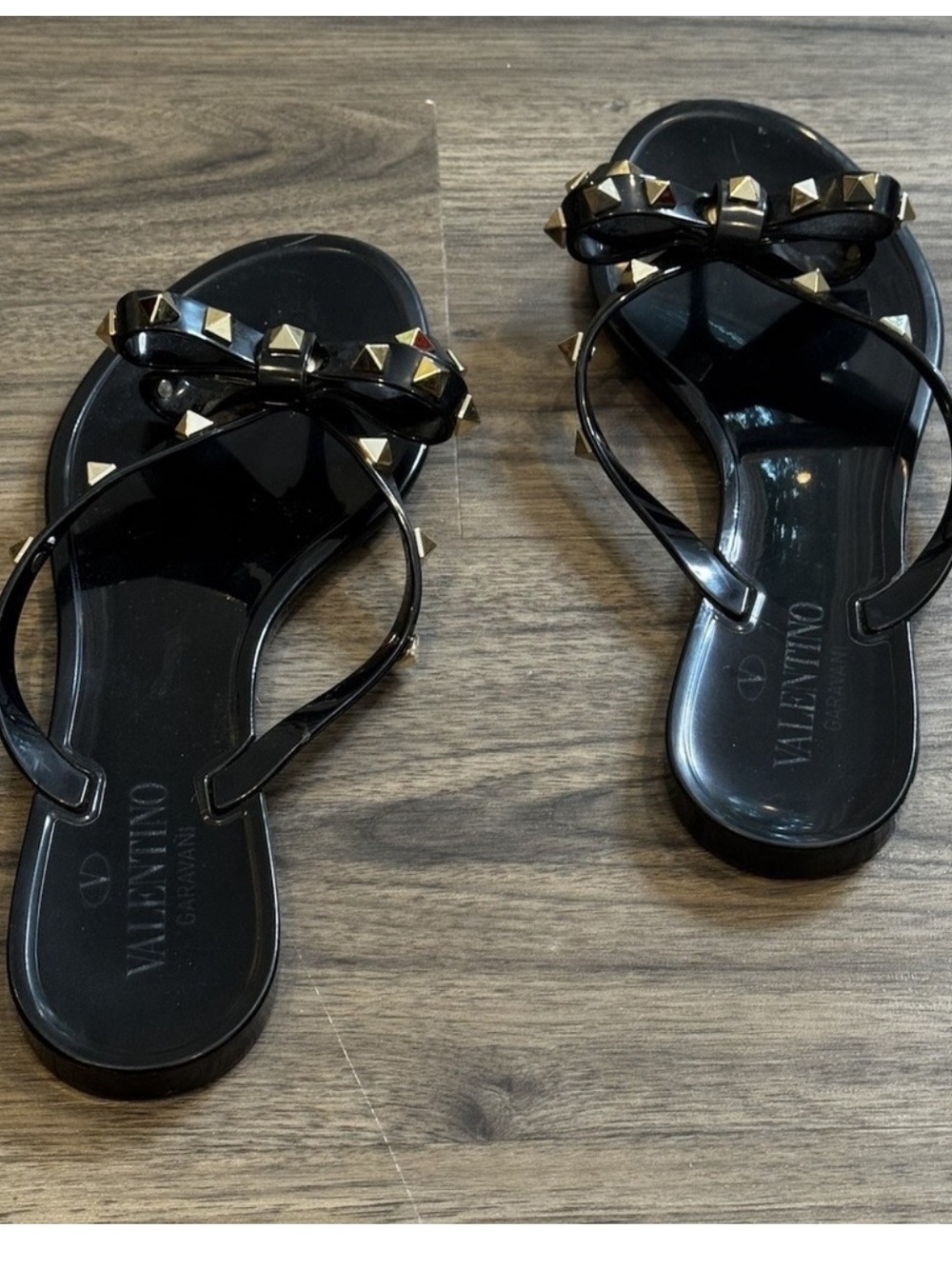Valentino Garavani Black Jelly Rockstud Bow Sandals